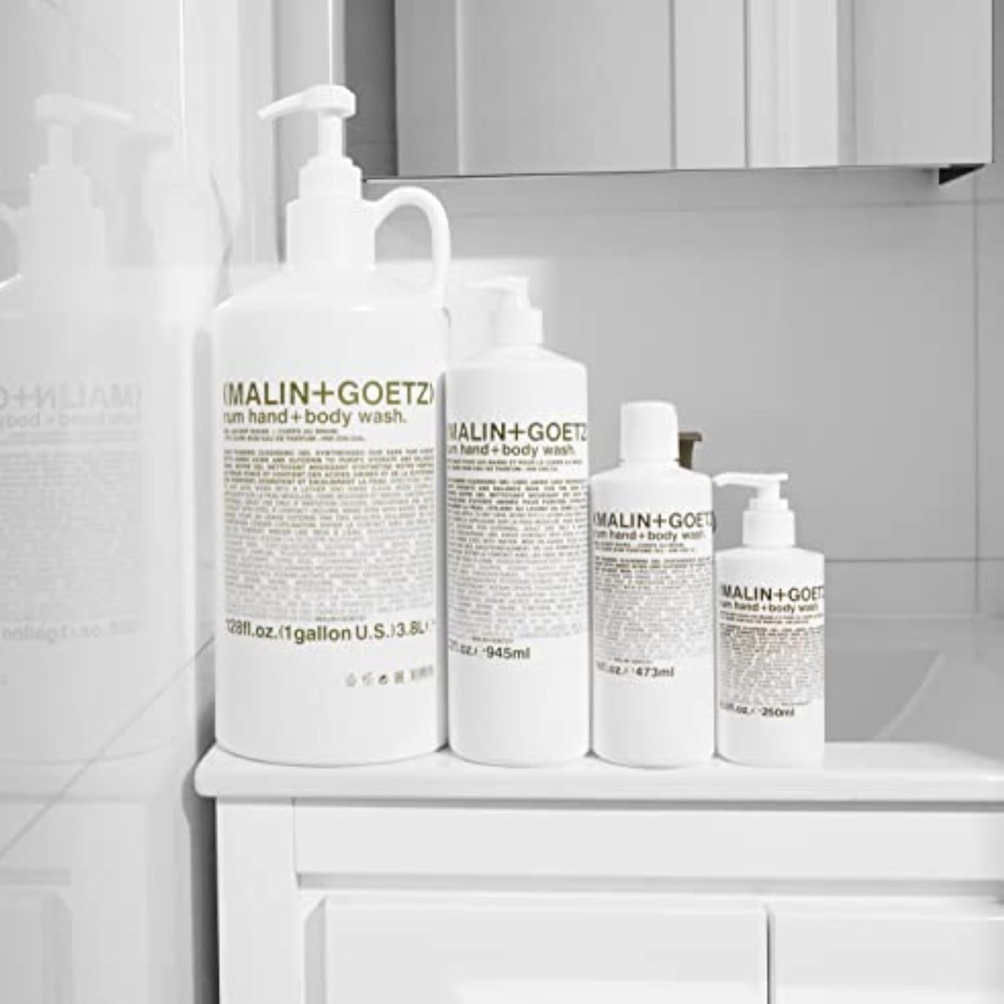 MALIN+GOETZ Rum Hand + Body Wash, 128 Fl. Oz. – Allows Up to 15 Refills, Natural Cleansing, Purifying & Hydrating for Women & Men, For All Skin Types, No Stripping or Drying, Cruelty-Free & Vegan